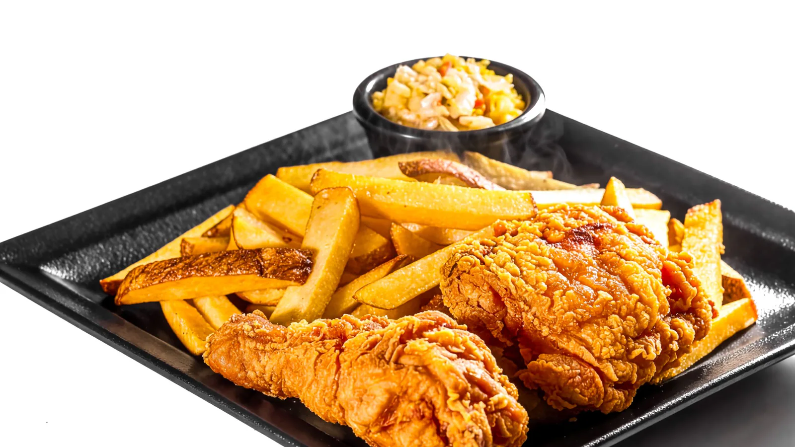 Frisby España abrirá su primer local en Madrid el 15 de agosto | ZonaFranquicia Ración de pollo frito crujiente acompañado de patatas fritas y ensalada de col. | ZonaFranquicia